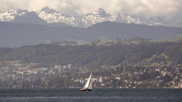 A boat of Segelschule Zuerich sailing school sails on Lake Zurich, amid the coronavirus disease (COVID-19) outbreak, near Zurich, Switzerland. (REUTERS) A boat of Segelschule Zuerich sailing school sails on Lake Zurich, amid the coronavirus disease (COVID-19) outbreak, near Zurich, Switzerland. (REUTERS)