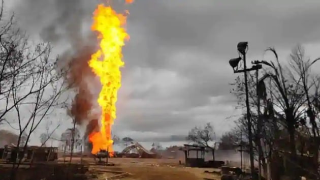 Work continued at the well site to control the fire and plug the blow out. OIL had earlier said that the process could take about 4 weeks. (Photo Credit: Oil India Limited) Work continued at the well site to control the fire and plug the blow out. OIL had earlier said that the process could take about 4 weeks. (Photo Credit: Oil India Limited)