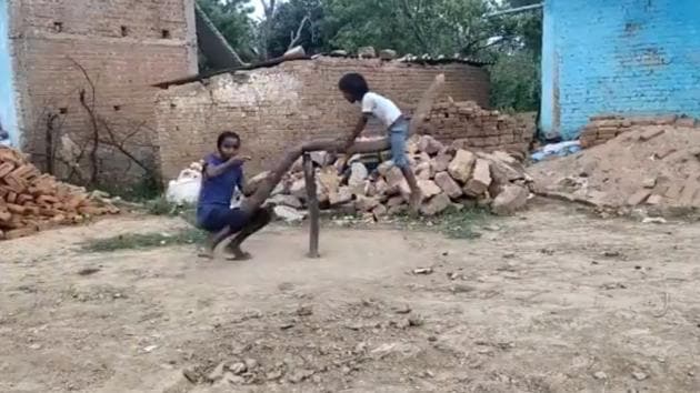 The image shows the children spinning around on their swing.(Twitter/@SherSingh_IAS) The image shows the children spinning around on their swing.(Twitter/@SherSingh_IAS)