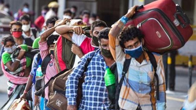 Chennai: Migrants stand in a queue at Central Railway Station to board a Shramik Special train for West Bengal, during ongoing COVID-19 lockdown, in Chennai, Wednesday, June 3, 2020. (PTI Photo/R Senthil Kumar) (PTI03-06-2020_000243B)(PTI PHOTO) Chennai: Migrants stand in a queue at Central Railway Station to board a Shramik Special train for West Bengal, during ongoing COVID-19 lockdown, in Chennai, Wednesday, June 3, 2020. (PTI Photo/R Senthil Kumar) (PTI03-06-2020_000243B)(PTI PHOTO)