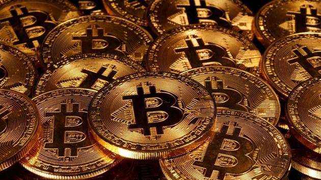 Bitcoin has flirted with $10,000 since May, failing to sustain a rally above that key psychological level after the closely watched “halving” industry event that reduced the amount of the cryptocurrency earned by miners. (Reuters file photo) Bitcoin has flirted with $10,000 since May, failing to sustain a rally above that key psychological level after the closely watched “halving” industry event that reduced the amount of the cryptocurrency earned by miners. (Reuters file photo)