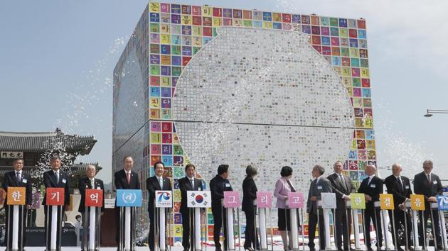 South Korean Prime Minister Chung Sye-kyun, (5th from left) and other participants attend a ceremony to unveil an installation artwork to commemorate the upcoming 70th anniversary of the Korean War, in Seoul on June 15. The two Koreas remain technically at war after Korean War hostilities ended with an armistice in 1953 that was never replaced with a peace treaty. (AP)