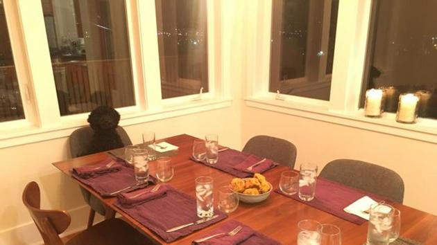The four-year-old pooch, Raleigh has a habit of plonking herself on the dining table every time she sees it being set. (Twitter/@jaywillis) The four-year-old pooch, Raleigh has a habit of plonking herself on the dining table every time she sees it being set. (Twitter/@jaywillis)