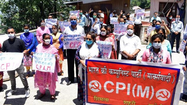 CPI (M) activists during their protest outside their state office in Shimla on Tuesday. (Deepak Sansta) CPI (M) activists during their protest outside their state office in Shimla on Tuesday. (Deepak Sansta)