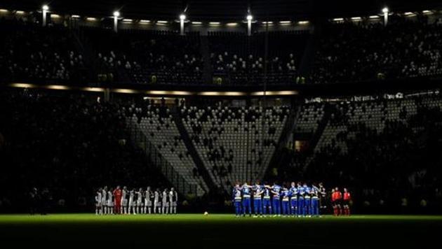 General view as the teams observe a minutes silence before the match.(REUTERS)