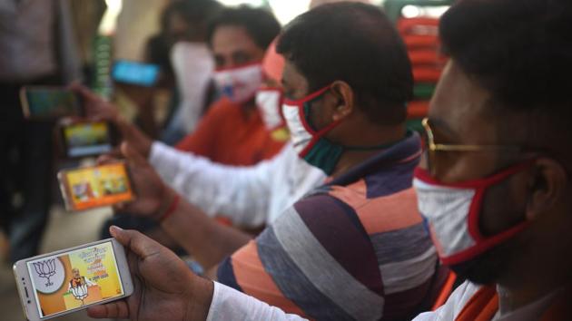 The BJP was among the first parties to understand the power of social media and it is no surprise that it has now become the first party to innovate with mass e-rallies(Samir Jana / Hindustan Times)