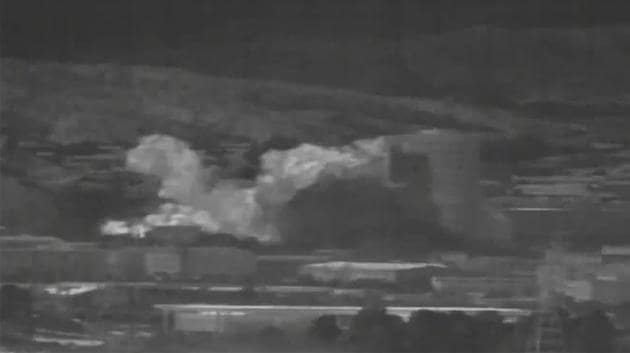 A captured image from a thermal observation device shows the explosion at the inter-Korean liaison office. Footage of the explosion released by Seoul’s presidential Blue House showed a blast rolling across several buildings just across the border in Kaesong, with a nearby tower partially collapsing as clouds of smoke rose into the sky. (Dong-A Ilbo / AFP)