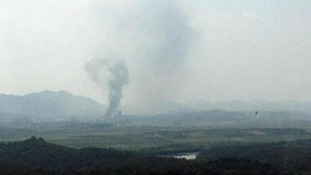 Smoke rises from North Korea’s Kaesong Industrial Complex where the inter-Korean liaison office was set up in 2018. The demolition came after state media quoted Kim Yo Jong -- the sister of North Korean leader Kim Jong Un -- saying on June 13 that the “useless north-south joint liaison office” would soon be seen “completely collapsed.” (Yonhap / AFP)