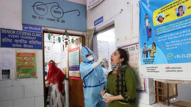 New Delhi, June 15 (ANI): Testing team collecting swab samples of health workers and Delhi Government martials, at a Delhi Government Dispensary at Majnu Ka Tila, in New Delhi on Monday. (ANI Photo)(ANI) New Delhi, June 15 (ANI): Testing team collecting swab samples of health workers and Delhi Government martials, at a Delhi Government Dispensary at Majnu Ka Tila, in New Delhi on Monday. (ANI Photo)(ANI)