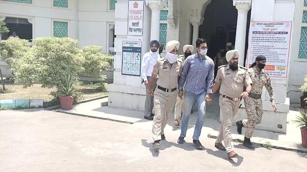 The SIT team with advocate Sohail Singh Brar at the Faridkot court complex on Wednesday.(Representative Image/HT)