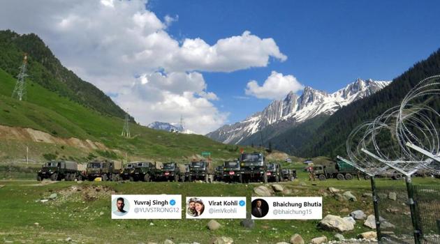Indian army soldiers walk past their parked trucks at a makeshift transit camp before heading to Ladakh, near Baltal, southeast of Srinagar.(Reuters) Indian army soldiers walk past their parked trucks at a makeshift transit camp before heading to Ladakh, near Baltal, southeast of Srinagar.(Reuters)