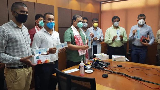 The team if IIT-Guwahati displaying the Covid-19 kits developed by the institute.(Twitter/@IITGuwahati) The team if IIT-Guwahati displaying the Covid-19 kits developed by the institute.(Twitter/@IITGuwahati)