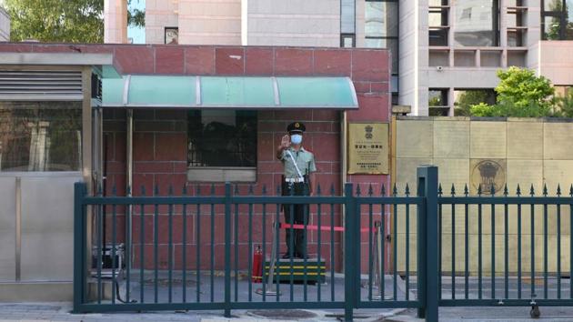 A Chinese paramilitary police officer stands guard at an entrance to the Indian embassy in Beijing on June 16. In New Delhi, Defence Minister Rajnath Singh briefed PM Modi on the developments along with two meetings with Chief of Defence Staff General Bipin Rawat and the three service chiefs, officials told HT. External Affairs Minister S Jaishankar was also present at one of the meetings. (Greg Baker / AFP) A Chinese paramilitary police officer stands guard at an entrance to the Indian embassy in Beijing on June 16. In New Delhi, Defence Minister Rajnath Singh briefed PM Modi on the developments along with two meetings with Chief of Defence Staff General Bipin Rawat and the three service chiefs, officials told HT. External Affairs Minister S Jaishankar was also present at one of the meetings. (Greg Baker / AFP)