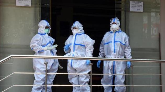 File photo: Medical professionals wearing PPE coveralls seen outside the Covid-19 ward at Sir Ganga Ram Hospital, in New Delhi.(Sonu Mehta/HT PHOTO) File photo: Medical professionals wearing PPE coveralls seen outside the Covid-19 ward at Sir Ganga Ram Hospital, in New Delhi.(Sonu Mehta/HT PHOTO)