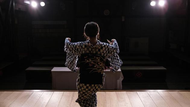 Chacha admitted she was initially confused by the idea. But with ‘Meet Geisha’ project manager Tamaki Nishimura’s help to organise the technical side, she and some others are now able to offer their traditional arts in the most modern of formats -- Zoom calls. The online sessions offer income, but also a way to broaden the audience for the community. (Philip Fong / AFP) Chacha admitted she was initially confused by the idea. But with ‘Meet Geisha’ project manager Tamaki Nishimura’s help to organise the technical side, she and some others are now able to offer their traditional arts in the most modern of formats -- Zoom calls. The online sessions offer income, but also a way to broaden the audience for the community. (Philip Fong / AFP)