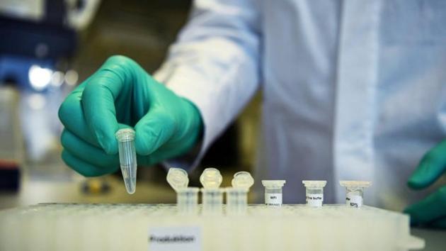 An employee of German biopharmaceutical company CureVac, demonstrates research workflow on a vaccine for the coronavirus (Covid-19) disease at a laboratory in Tuebingen, Germany. (REUTERS)