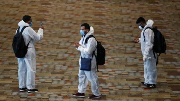 Seafarers who have spent the past months working onboard vessels arrive at the Changi Airport to board their flight back home to India during a crew change amid the coronavirus disease (COVID-19) outbreak in Singapore.(REUTERS) Seafarers who have spent the past months working onboard vessels arrive at the Changi Airport to board their flight back home to India during a crew change amid the coronavirus disease (COVID-19) outbreak in Singapore.(REUTERS)