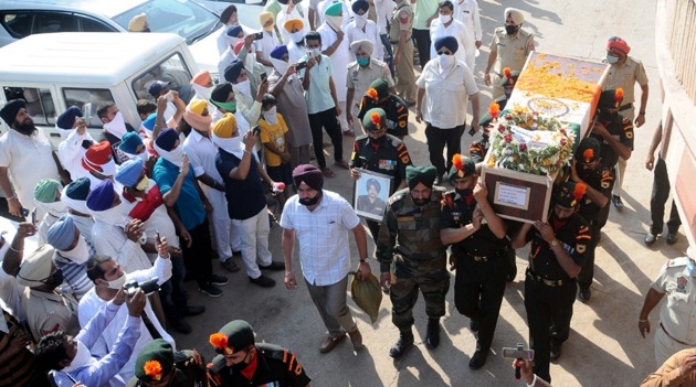 Funeral procession of Naik Subedar Mandip Singh who was killed in a clash with Chinese troops in Ladakhs Galwan valley, in Seel village in Patiala district. (Bharat Bhushan/HT PHOTO) Funeral procession of Naik Subedar Mandip Singh who was killed in a clash with Chinese troops in Ladakhs Galwan valley, in Seel village in Patiala district. (Bharat Bhushan/HT PHOTO)