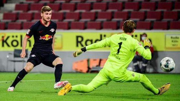 RB Leipzig's Timo Werner scores their third goal, as play resumes behind closed doors following the outbreak of the coronavirus disease (COVID-19).(REUTERS)