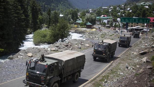 An Indian army convoy moves on the Srinagar- Ladakh highway at Gagangeer, north-east of Srinagar, India, Wednesday, June 17, 2020.(AP)