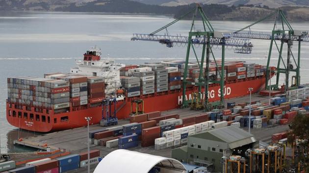 Containers are loaded onto a ship for export at Lyttelton Port near Christchurch, New Zealand.(AP Photo)