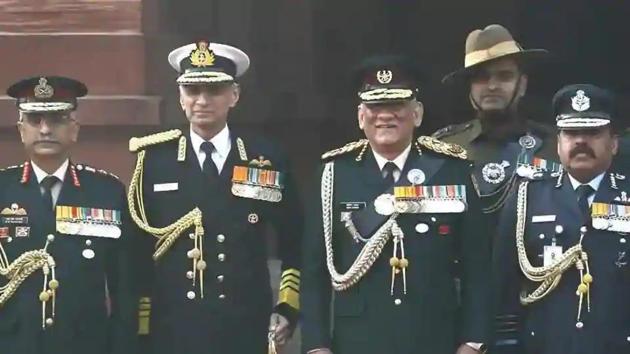 Chief of Defence Staff (CDS) General Bipin Rawat, second right, with Indian Air Force Air Chief Marshal Rakesh Kumar Singh Bhadauria, right, India Army Chief General Manoj Mukund Naravane, left, and the chief of Indian Naval staff Admiral Karambir Singh.(AP photo)