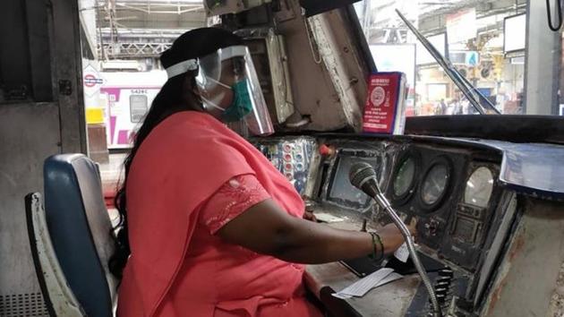Motorwoman Manisha Mhaske Ghorpade with face shield and mask driving the local.(Twitter/@Central_Railway)