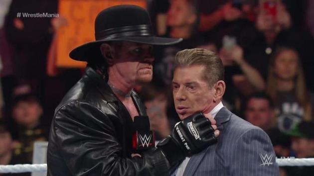 Vince McMahon with The Undertaker.(WWE)