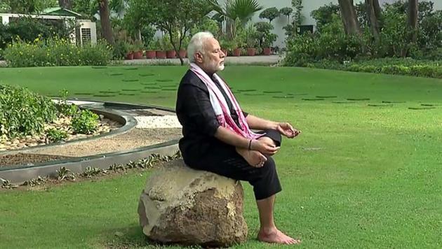 “These are times of distancing. But do you know Yoga is what ends distance? Yoga is that which joins or brings things together,” PM Modi said.(Twitter)