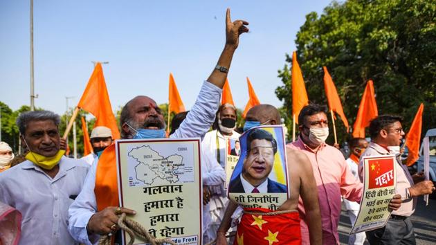BJP Supporters hold placards and shout slogans during a protest against the Galwan Valley face-off, near the Chinese embassy in Chanakyapuri, New Delhi, India on June 18, 2020.(Amal KS/HT PHOTO)