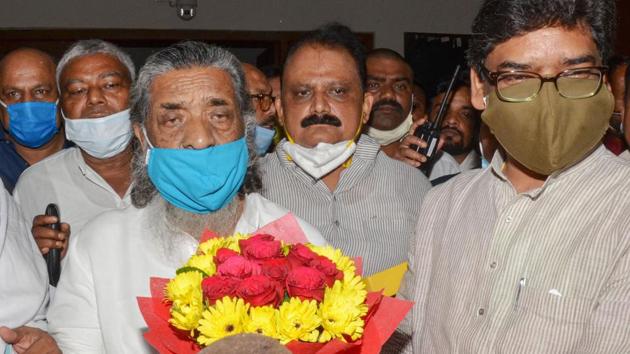Jharkhand chief minister Hemant Soren presents a flower bouquet to his father and Jharkhand Mukti Morcha (JMM) Chief Shibu Soren after he won Rajya Sabha Election from Jharkhand (PTI Photo) Jharkhand chief minister Hemant Soren presents a flower bouquet to his father and Jharkhand Mukti Morcha (JMM) Chief Shibu Soren after he won Rajya Sabha Election from Jharkhand (PTI Photo)