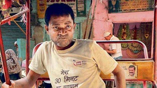 Rajinder is perched on the passenger seat of his rickshaw in a central Delhi market lane. He’s waiting for customers. It is still early in the morning. (HT Photos) Rajinder is perched on the passenger seat of his rickshaw in a central Delhi market lane. He’s waiting for customers. It is still early in the morning. (HT Photos)