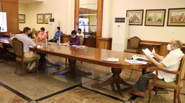 Delhi Lt Governor Anil Baijal interacts with Chief Minister Arvind Kejriwal during a meeting with Delhi Disaster Management Authority (DDMA) at Rajniwas, in New Delhi on Saturday. (HT PHOTO) Delhi Lt Governor Anil Baijal interacts with Chief Minister Arvind Kejriwal during a meeting with Delhi Disaster Management Authority (DDMA) at Rajniwas, in New Delhi on Saturday. (HT PHOTO)