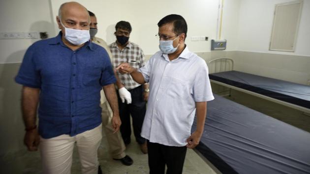 Delhi CM Arvind Kejriwal (R) and Deputy CM Manish Sisodia (L) inspect Burari Hospital, which will be turned into a quarantine facility for Covid-19 patients. Delhi hit the 50,000-mark four days later than predicted by a five-member panel set up in early June. The committee had said there would be 50,000 cases by mid June, and 100,000 cases by the end of the month. (Biplov Bhuyan / HT PHOTO) Delhi CM Arvind Kejriwal (R) and Deputy CM Manish Sisodia (L) inspect Burari Hospital, which will be turned into a quarantine facility for Covid-19 patients. Delhi hit the 50,000-mark four days later than predicted by a five-member panel set up in early June. The committee had said there would be 50,000 cases by mid June, and 100,000 cases by the end of the month. (Biplov Bhuyan / HT PHOTO)