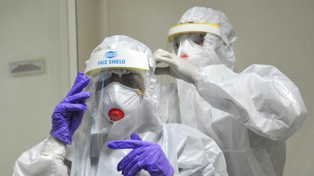 Doctors in PPE suits. (Photo: Nitin Kanotra /HT) Doctors in PPE suits. (Photo: Nitin Kanotra /HT)