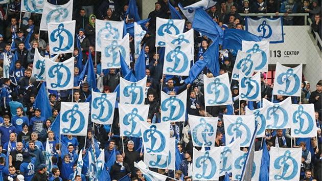 Dynamo Moscow fans hold up signs with Dynamo logo during a Russian Football Premier League match.(Getty Images)