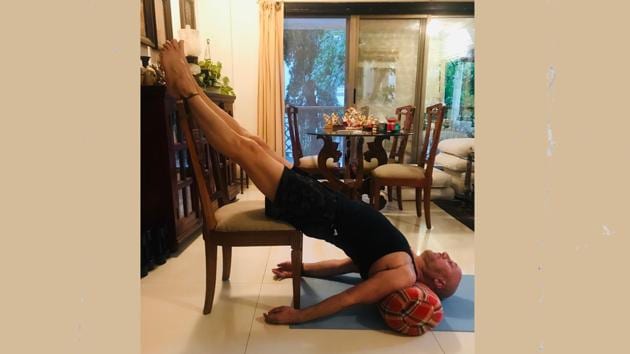 Anupam Kher impressed his fans by sharing a picture from his yoga routine. He said, “If you can’t go outside. Go inside!!”