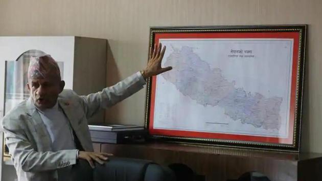 Nepal’s foreign minister Pradeep Gyawali points to a map of Nepal in Kathmandu.(AP/ File photo)