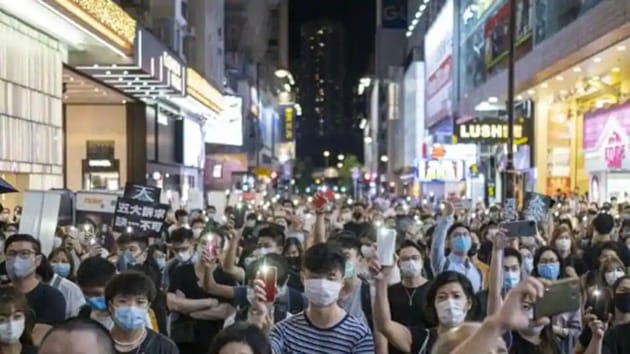Anti-government protesters smashed their way into the locked Hong Kong legislative complex on the anniversary last year, spray painting slogans on the walls and damaging the electronic voting system. (Bloomberg) Anti-government protesters smashed their way into the locked Hong Kong legislative complex on the anniversary last year, spray painting slogans on the walls and damaging the electronic voting system. (Bloomberg)