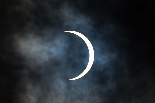 The solar eclipse seen through a cloud cover in New Delhi. (Sanchit Khanna/HT PHOTO) The solar eclipse seen through a cloud cover in New Delhi. (Sanchit Khanna/HT PHOTO)