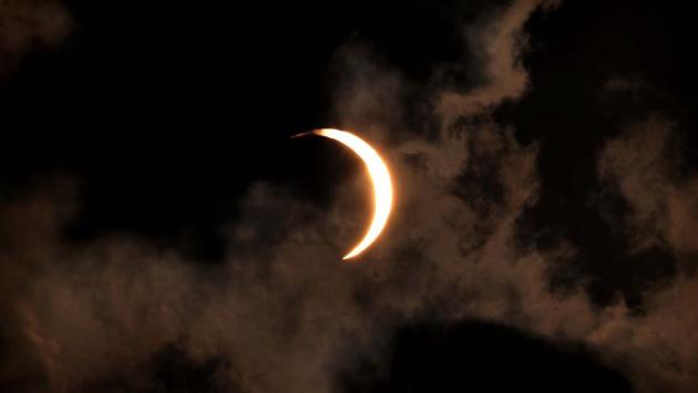 The partial solar eclipse seen from Chandigarh on June 21. The solar eclipse started a little after 9 am in India after the sun, the moon and the earth came in a straight line. (Ravi Kumar / HT Photo) The partial solar eclipse seen from Chandigarh on June 21. The solar eclipse started a little after 9 am in India after the sun, the moon and the earth came in a straight line. (Ravi Kumar / HT Photo)