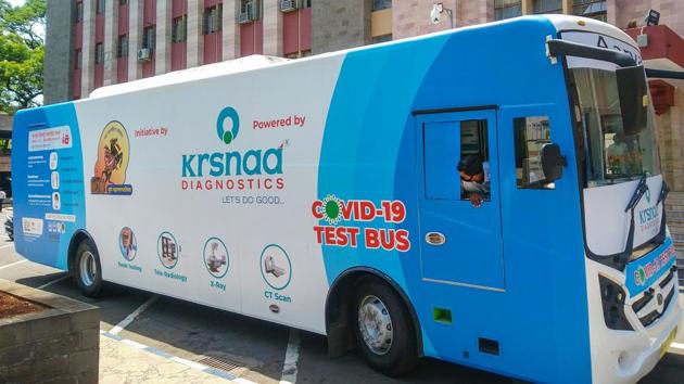 A Covid-19 test bus being jointly launched by KRSNAA Diagnostics centre and Pune Municipal Corporation (PMC) which will check the residents of slum areas in the city, in Pune. (PTI) A Covid-19 test bus being jointly launched by KRSNAA Diagnostics centre and Pune Municipal Corporation (PMC) which will check the residents of slum areas in the city, in Pune. (PTI)