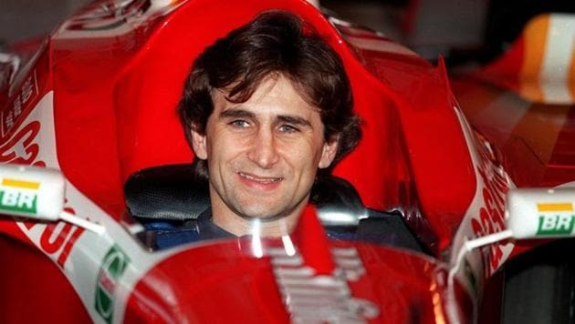 New Williams driver Alex Zanardi sits in the Williams car. (Action Images)