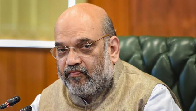 Home Minister Amit Shah during a meeting on strengthening the Covid-19 response in the National Capital Territory (NCT) of Delhi on Sunday.(PTI PHOTO.) Home Minister Amit Shah during a meeting on strengthening the Covid-19 response in the National Capital Territory (NCT) of Delhi on Sunday.(PTI PHOTO.)