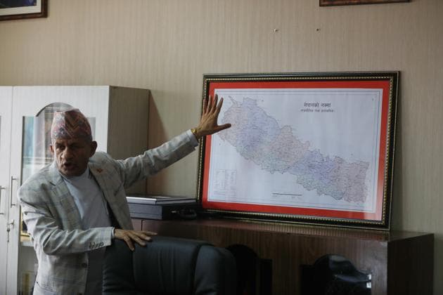 Nepal’s foreign minister Pradeep Gyawali points to a map of Nepal in Kathmandu.(AP/ File photo)