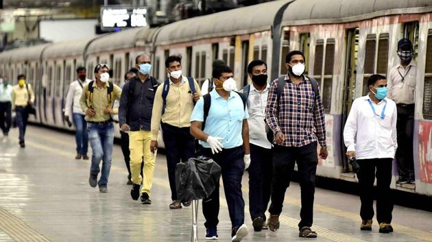 Essential service workers head to board a local train at CSMT in Mumbai on June 19. Maharashtra, according to officials, is going to see a steady rise in cases for a few more days. The state government has been highlighting the improvement in the doubling rate and betterment in the recovery rate, but the rise in CFR has proved worrisome. (Anshuman Poyrekar / HT Photo)