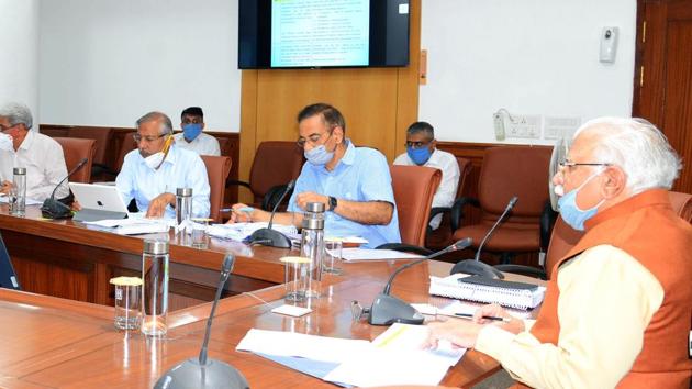 Haryana chief minister Manohar Lal Khattar presiding over the 53rd meeting of water supply and sewerage board of public health engineering department in Chandigarh on Monday. (HT PHOTO) Haryana chief minister Manohar Lal Khattar presiding over the 53rd meeting of water supply and sewerage board of public health engineering department in Chandigarh on Monday. (HT PHOTO)