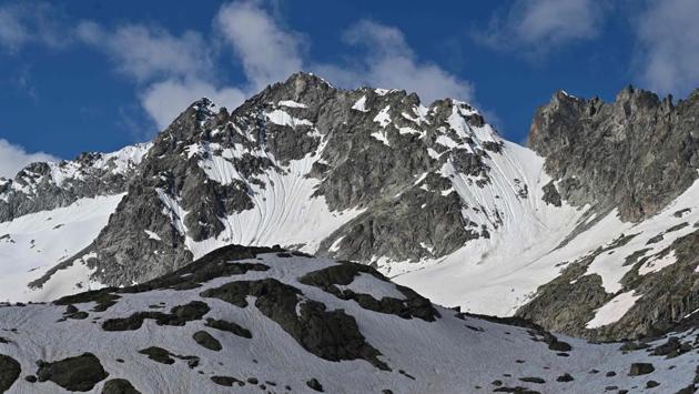 Mountains surrounding the Presena glacier on the Val di Sole near Pellizzano. From around 30,000 square metres in 2008 when the project began, Panizza’s team now places 100,000 square metres under wraps. “There are glacier cover systems similar to ours on a few Austrian glaciers, but the surface covered by the tarpaulins is much smaller,” Panizza said AFP. (Miguel Medina / AFP) Mountains surrounding the Presena glacier on the Val di Sole near Pellizzano. From around 30,000 square metres in 2008 when the project began, Panizza’s team now places 100,000 square metres under wraps. “There are glacier cover systems similar to ours on a few Austrian glaciers, but the surface covered by the tarpaulins is much smaller,” Panizza said AFP. (Miguel Medina / AFP)