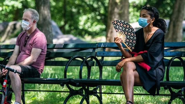 People enjoy the weather in Central Park, the day before the city starts phase two of reopening after the lockdown due to the coronavirus disease (Covid-19), in the Manhattan borough of New York City, US.(Reuters Photo)