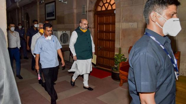 Union Home Minister Amit Shah and Delhi CM Arvind Kejriwal arrive for a meeting on the Covid-19 situation in the national capital, during the ongoing nationwide lockdown, in New Delhi.(PTI)